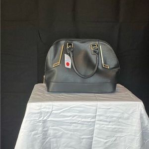 Black and gold leather bag